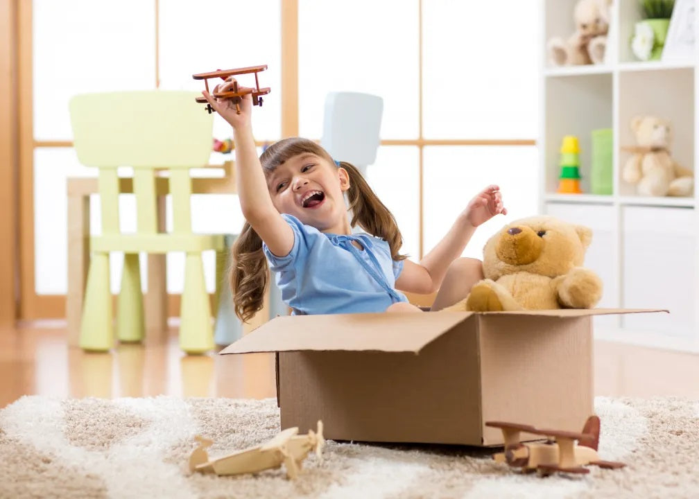 Child playing alone with building blocks to promote independent play